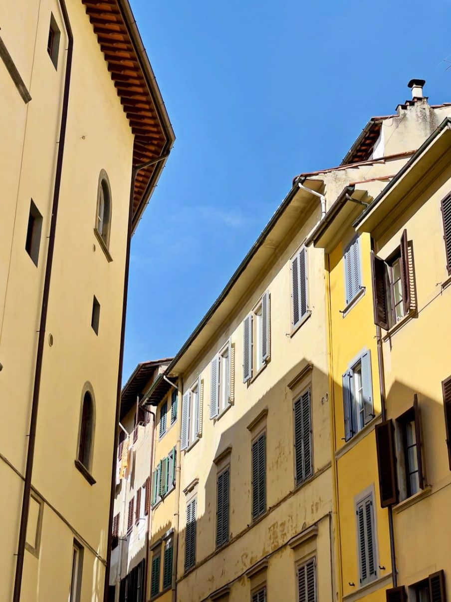 21 Photos to Inspire You to Visit Florence, Italy. Historic center of Florence and yellow-painted homes