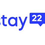 The logo shows the word "stay" in blue lowercase letters, followed by a blue speech bubble containing the number "22" in black. The background is white.